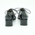 Vavoulas Black Patent Leather Lace-Up Pointed-Toe Cut-Out Mid Heel Bootie | 2026VAV07