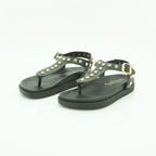 Yokono Black Leather Gold Pyramid Studded T-Bar Flat Sandal | MORENA-315
