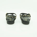 Yokono Black Leather Gold Pyramid Studded T-Bar Flat Sandal | MORENA-315