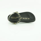 Yokono Black Leather Gold Pyramid Studded T-Bar Flat Sandal | MORENA-315